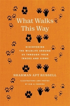 Paperback What Walks This Way: Discovering the Wildlife Around Us Through Their Tracks and Signs Book