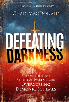 Paperback Defeating Darkness: A Handbook for Spiritual Warfare and Overcoming Demonic Schemes Book