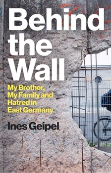 Hardcover Behind the Wall: My Brother, My Family and Hatred in East Germany Book