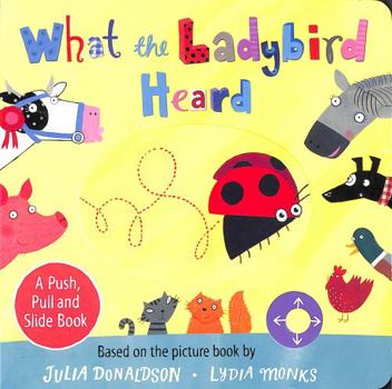 Board book What the Ladybird Heard: A Push, Pull and Slide Board Book