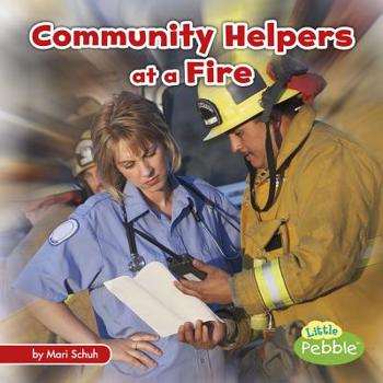 Paperback Community Helpers at a Fire Book