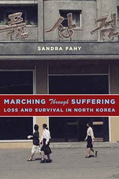 Paperback Marching Through Suffering: Loss and Survival in North Korea Book