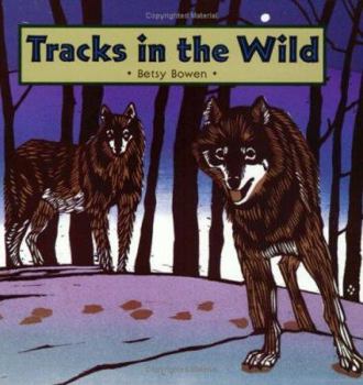 Paperback Tracks in the Wild Book