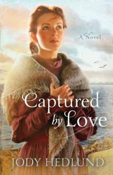 Hardcover Captured by Love (Thorndike Press Large Print Christian Romance) [Large Print] Book