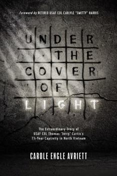 Paperback Under the Cover of Light Book