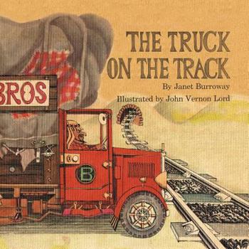 Paperback The Truck on the Track Book