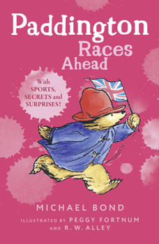 Paperback Paddington Races Ahead Book