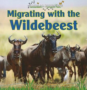 Paperback Migrating with the Wildebeest Book