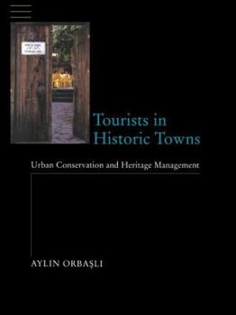 Hardcover Tourists in Historic Towns: Urban Conservation and Heritage Management Book