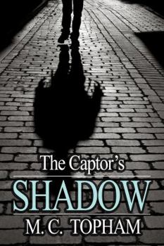 Paperback The Captor's Shadow Book