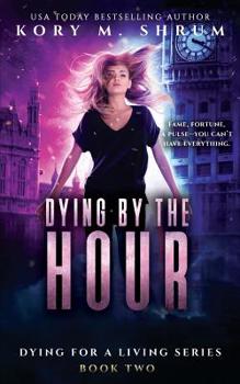 Paperback Dying by the Hour Book