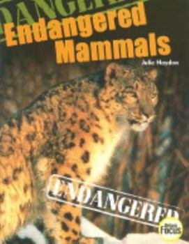 Paperback Endangered Mammals (Nelson Focus) Book