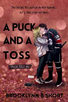 Paperback A Puck and a Toss Book