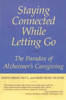 Paperback Staying Connected While Letting Go: The Paradox of Alzheimer's Caregiving Book