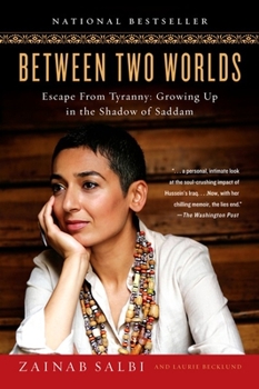 Paperback Between Two Worlds: Escape from Tyranny: Growing Up in the Shadow of Saddam Book