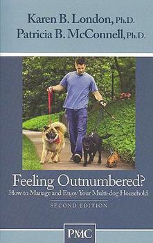 Paperback Feeling Outnumbered?: How to Manage and Enjoy Your Multi-Dog Household Book