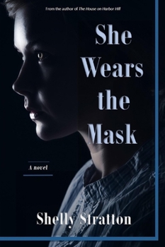 Paperback She Wears the Mask Book