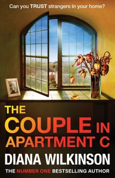 Paperback The Couple in Apartment C Book