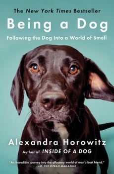 Paperback Being a Dog: Following the Dog Into a World of Smell Book