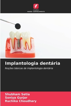 Paperback Implantologia dentária [Portuguese] Book