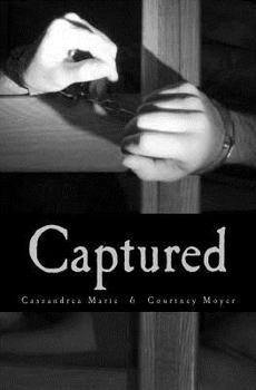 Paperback Captured Book