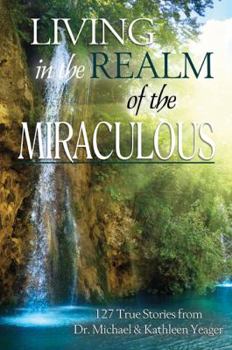 Paperback Living in the Realm of the Miraculous Book