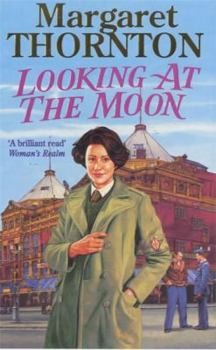 Paperback Looking at the Moon Book