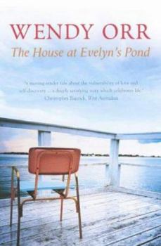 Paperback The House at Evelyn's Pond Book