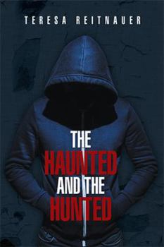 Paperback The Haunted and the Hunted Book