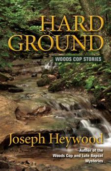Paperback Hard Ground: Woods Cop Stories Book