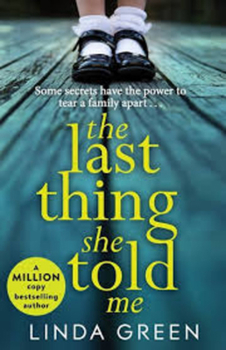 Paperback The Last Thing She Told Me Book