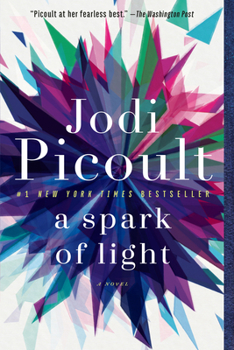 Paperback A Spark of Light Book