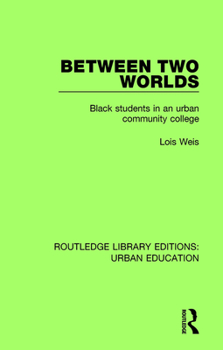 Paperback Between Two Worlds: Black Students in an Urban Community College Book