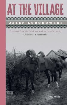Paperback At the Village Book