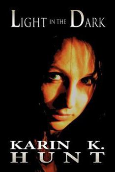 Paperback Light in the Dark Book