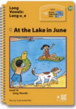 Paperback At the lake in June (Leap into literacy series) Book