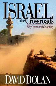 Paperback Israel at the Crossroads: Fifty Years and Counting Book