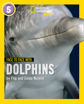Paperback Face to Face with Dolphins: Level 5 (National Geographic Readers) Book