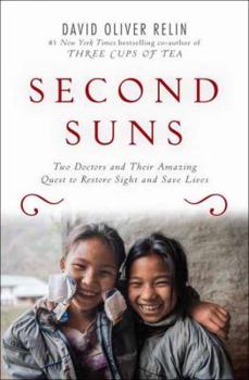 Hardcover Second Suns: Two Doctors and Their Amazing Quest to Restore Sight and Save Lives Book
