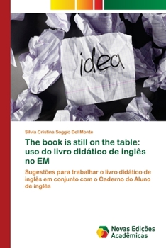 Paperback The book is still on the table: uso do livro didático de inglês no EM [Portuguese] Book
