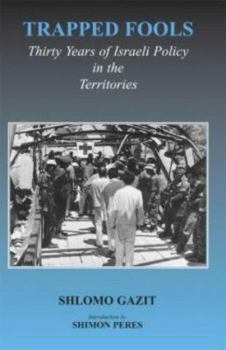 Paperback Trapped Fools: Thirty Years of Israeli Policy in the Territories Book