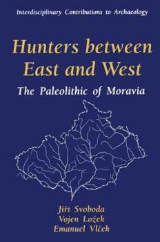 Paperback Hunters Between East and West: The Paleolithic of Moravia Book