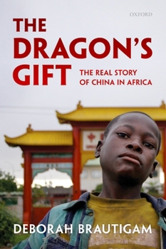 Paperback Dragon's Gift: The Real Story of China in Africa Book