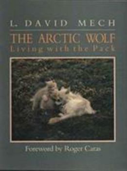 Paperback The Arctic Wolf Living with the Pack Book