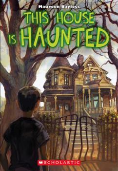 Paperback This House is Haunted Book
