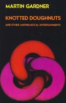 Paperback Knotted Doughnuts and Other Mathematical Entertainments Book
