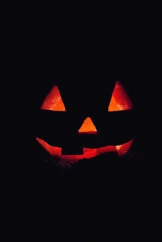 Glowing Jack O Lantern Journal: 100-page blank lined journal with glowing jack o lanterns on a black background