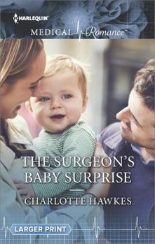 Mass Market Paperback The Surgeon's Baby Surprise [Large Print] Book