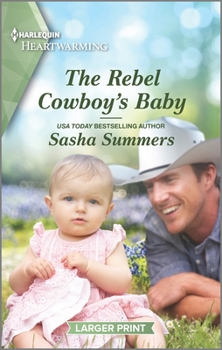 Mass Market Paperback The Rebel Cowboy's Baby: A Clean Romance [Large Print] Book