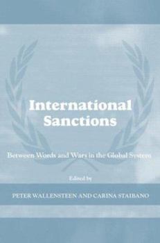 Hardcover International Sanctions: Between Wars and Words Book